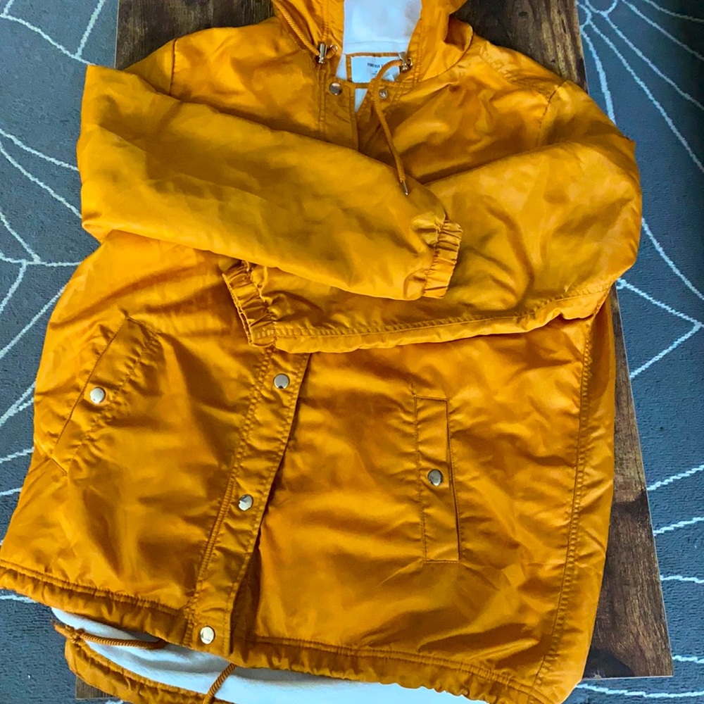 light fuzzy mustard colored jacket